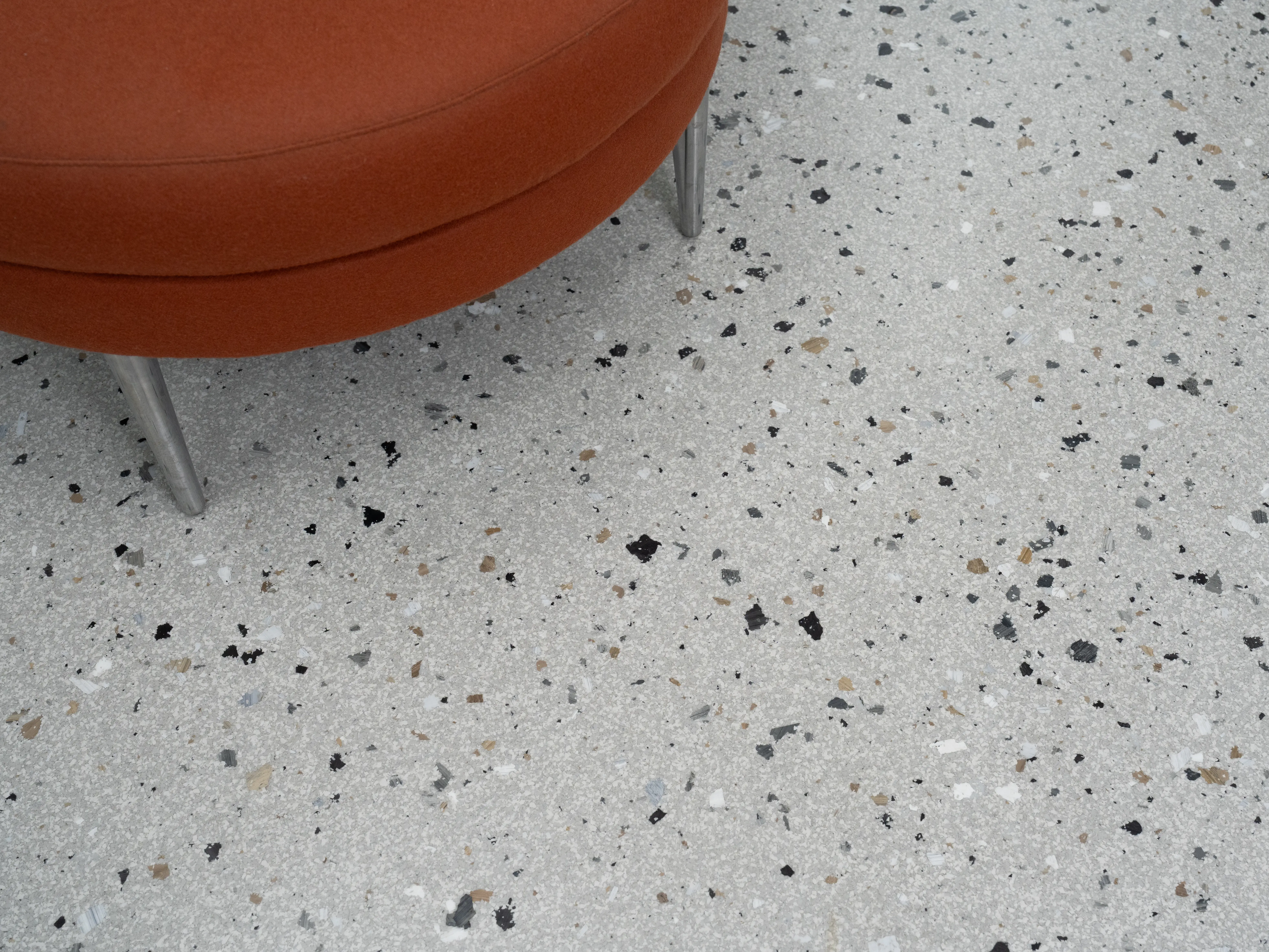 Decorative flake epoxy floor in a commercial office (Litho Flake Zinc)