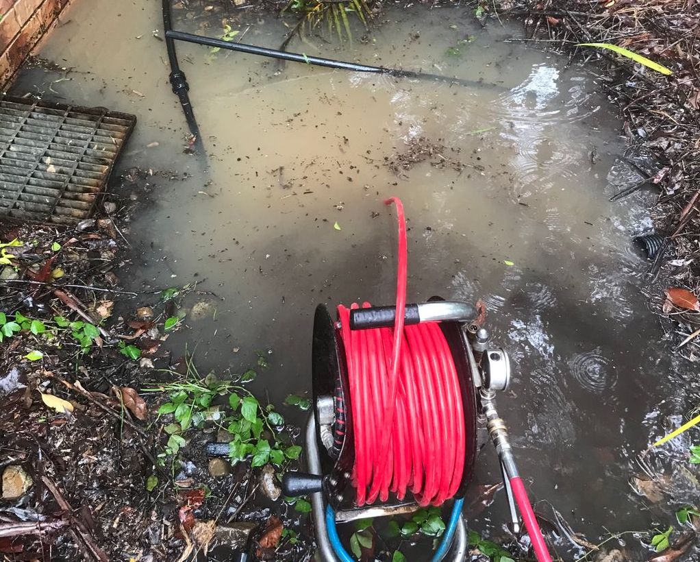 Blocked external yard storm water drain